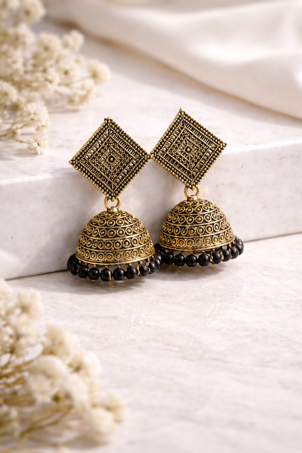 Antique Noir Jhumkas – Vintage Gold Statement Earrings with Black Beads